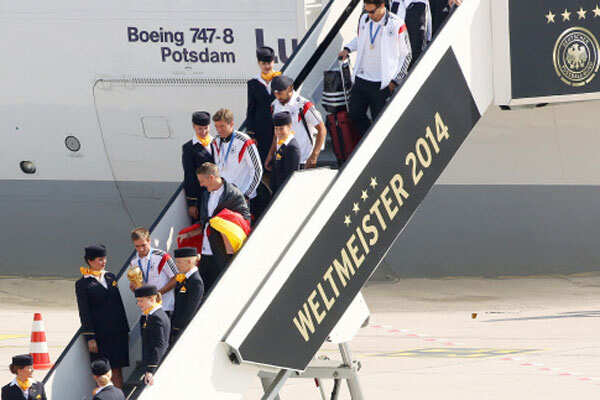 Photo - World Cup heroes return to rousing welcome Photo - World Cup heroes return to rousing welcome