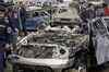 Twin suicide car bombs rock Baghdad