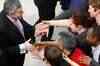 Britons vote in tight election race