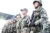 China denies troops presence in PoK