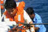 Coast Guard saves crew member of foreign vessel