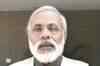 Narendra Modi takes on PM Manmohan Singh